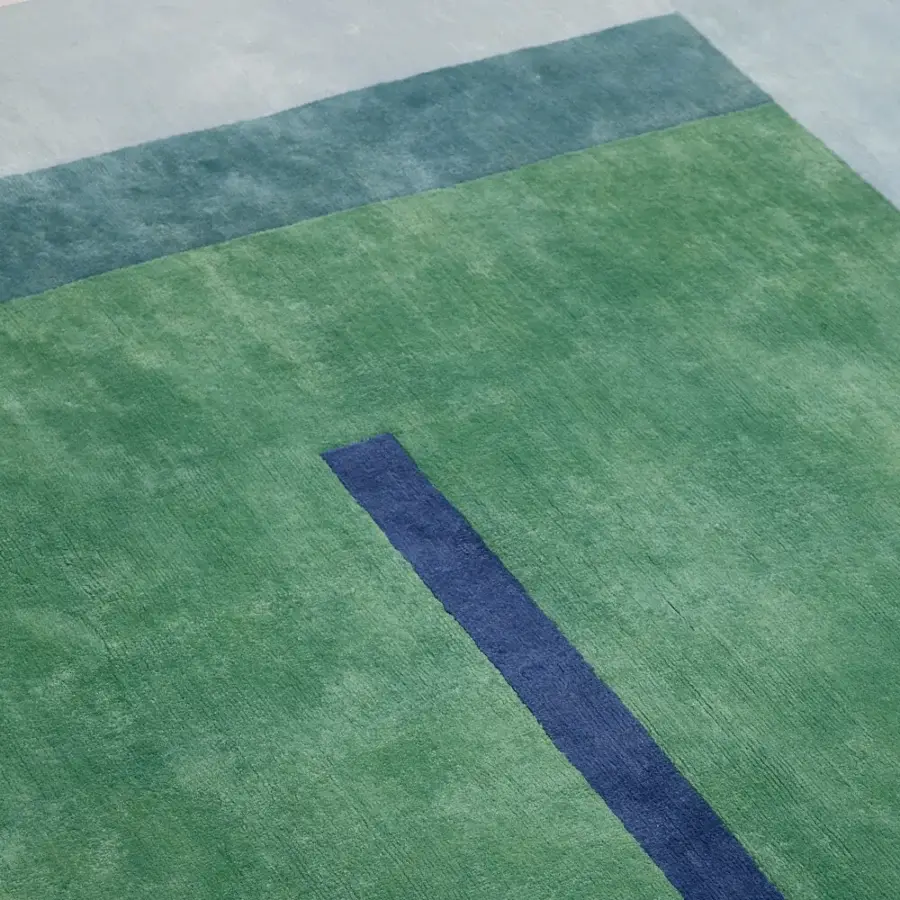 Distinguished Amini Nostalghia rug with geometric design hand-knotted in organic cotton with natural dyes and carved finish