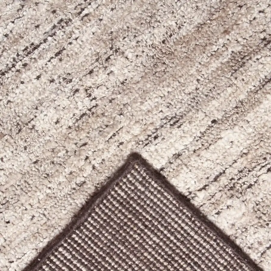 Lavish Amini Perla rug hand-knotted in neutral beige with bamboo silk and wool, exhibiting a hand-washed clipped finish