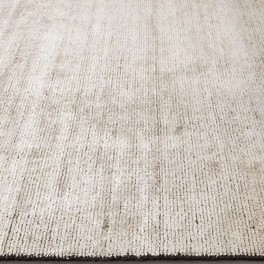 Superior Amini Perla rug hand-knotted in ivory with a blend of bamboo silk and wool, finished with a hand-washed clip