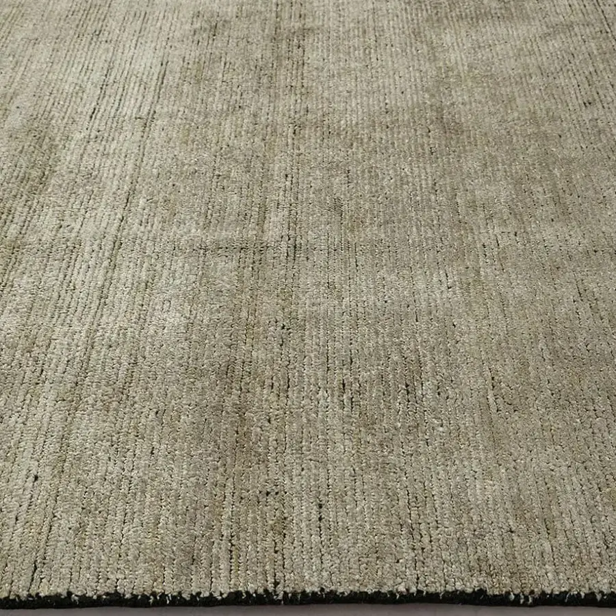 Distinguished Amini Perla rug hand-knotted in a blend of bamboo silk and wool with a subtly textured, muted beige finish