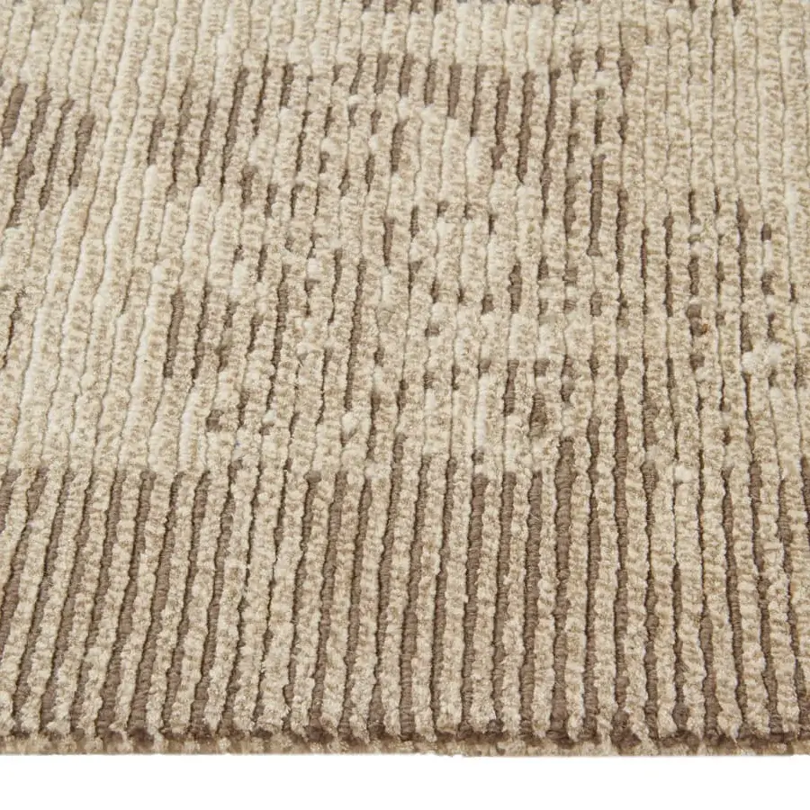 Superior Amini Mystique rug hand-knotted in Nepal with silk and Tibetan wool exhibiting a gradient beige surface with textured vertical ribbing