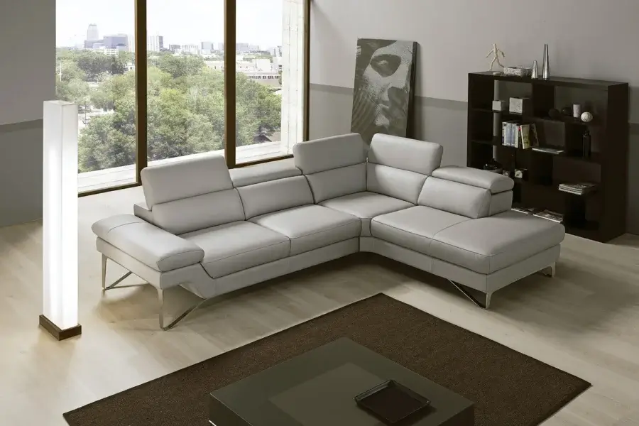 Elegant Egoitaliano Princess reclining sectional in neutral gray textile with polished stainless steel legs and hardwood frame