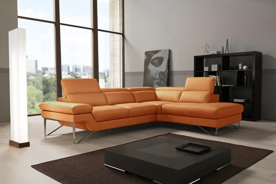 Distinguished Egoitaliano Princess reclining sectional in vibrant orange leather with polished stainless steel legs