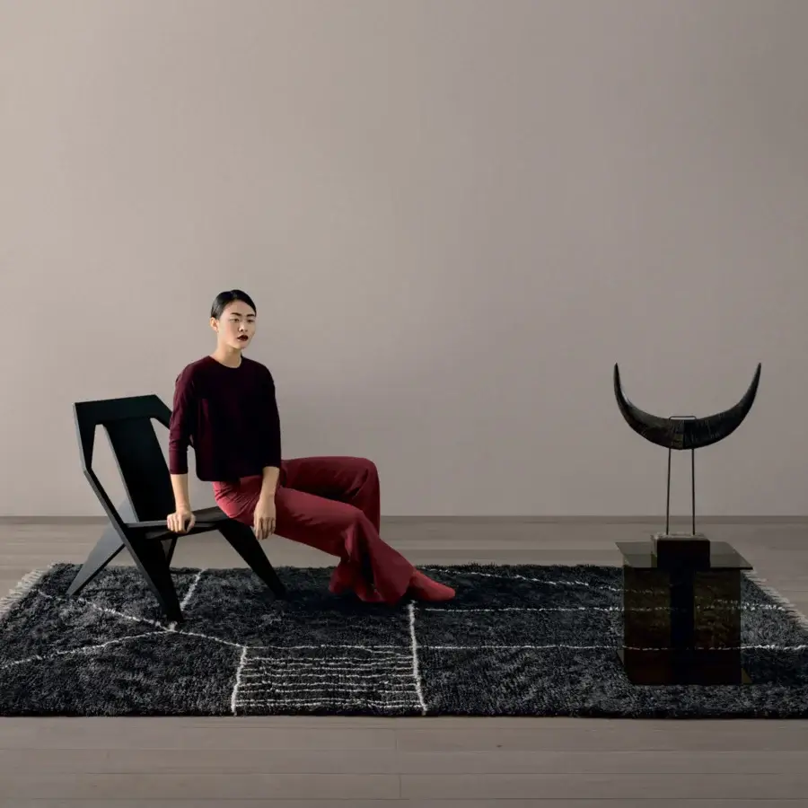 Exceptional Amini Nomadic rug hand-knotted in India with charcoal and ivory wool and mohair, exhibiting a carved finish