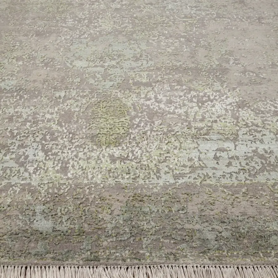 Superior Amini Bellagio rug hand-knotted in India with wool and viscose exhibiting blended shades of gray, beige, and green with a carved finish