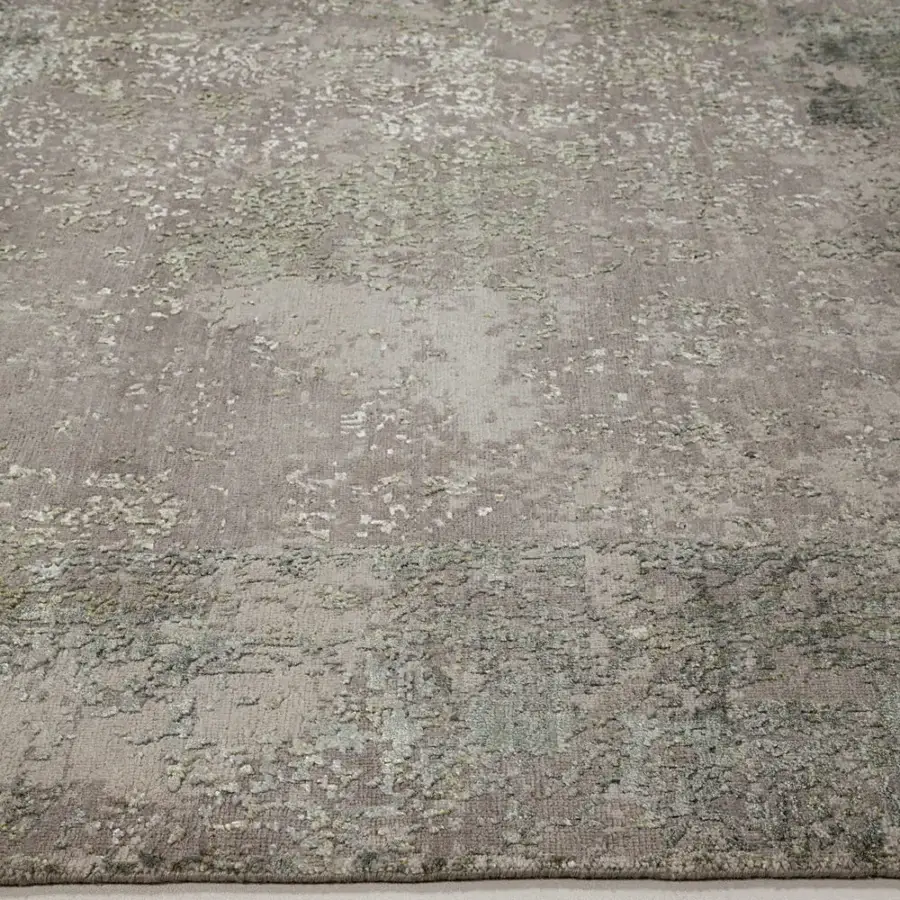 Distinguished Amini Bellagio rug hand-knotted with wool and viscose displaying a muted gray, beige, and green palette with a textured two-level pile finish