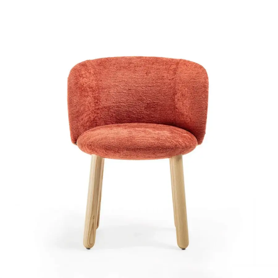 Distinguished Enrico Pellizzoni Isabel chair with plush terracotta fabric and beautifully turned solid wood legs with satin finish