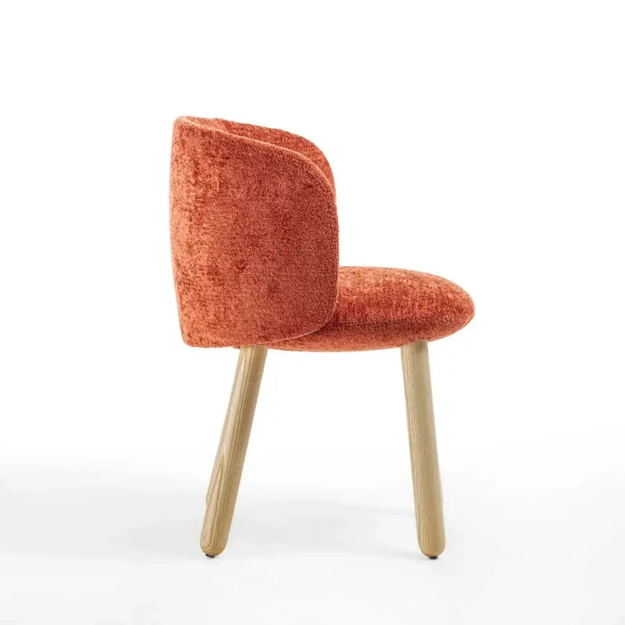 Exceptional Enrico Pellizzoni Isabel chair with textured terracotta bouclé fabric and turned natural ash wood legs