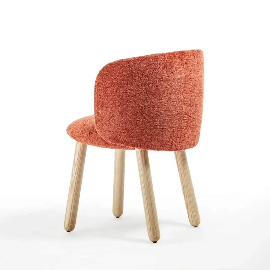 Harmonious Enrico Pellizzoni Isabel chair with textured terracotta fabric and beautifully turned natural ash wood legs