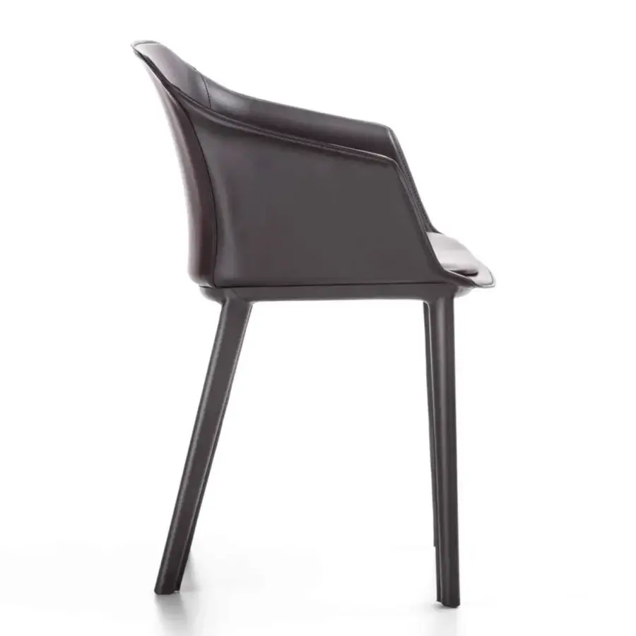 Distinguished Enrico Pellizzoni Eva armchair with gracefully curved form and satin-finish reddish-brown leather upholstery