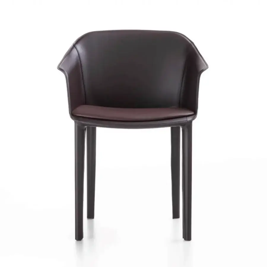 Captivating Enrico Pellizzoni Eva armchair with curved form and integrated seat, upholstered in brownish-purple leather with tonal variations