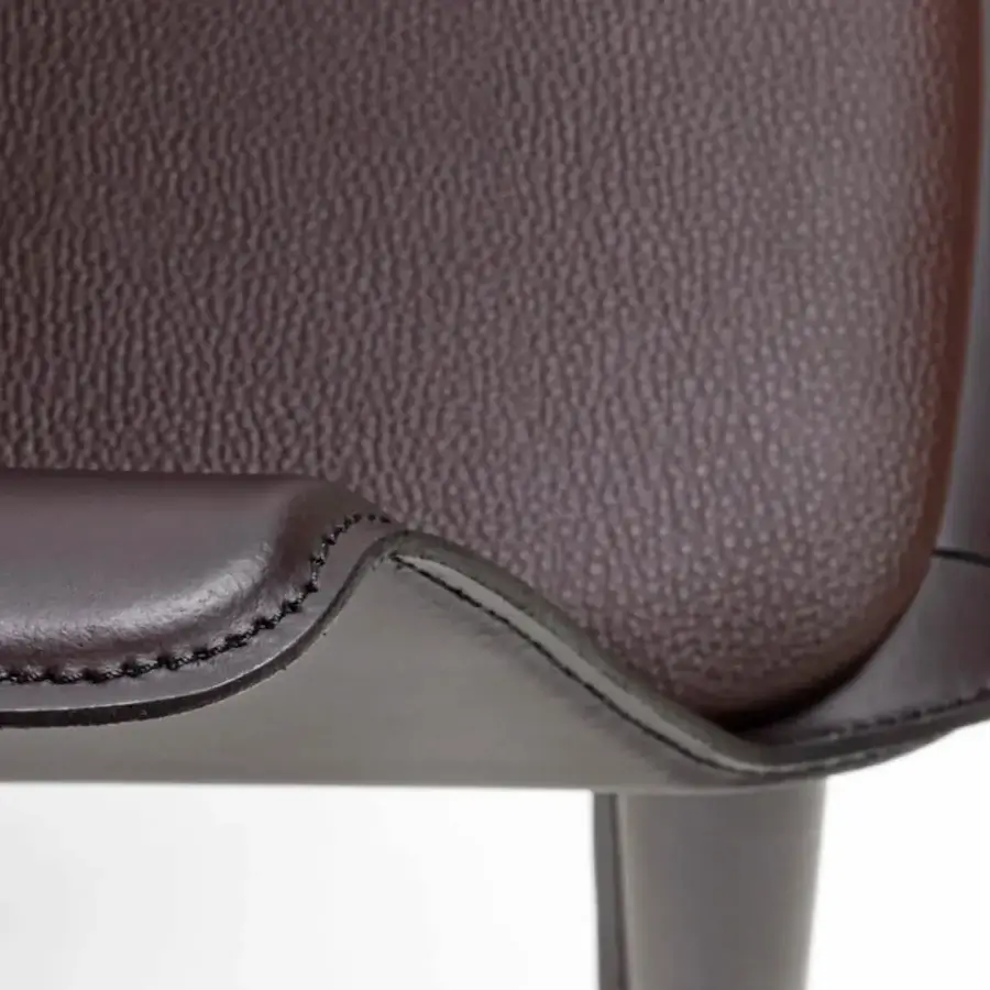 Distinguished Enrico Pellizzoni Eva armchair with dark brown leather upholstery and matte finish, showcasing delicate stitched detailing