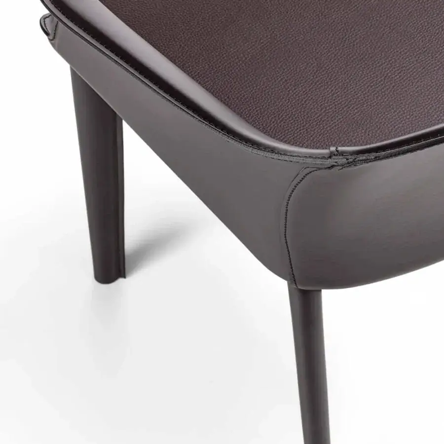Distinguished Enrico Pellizzoni Eva armchair with dark brown leather upholstery and sleek integrated seat cushion