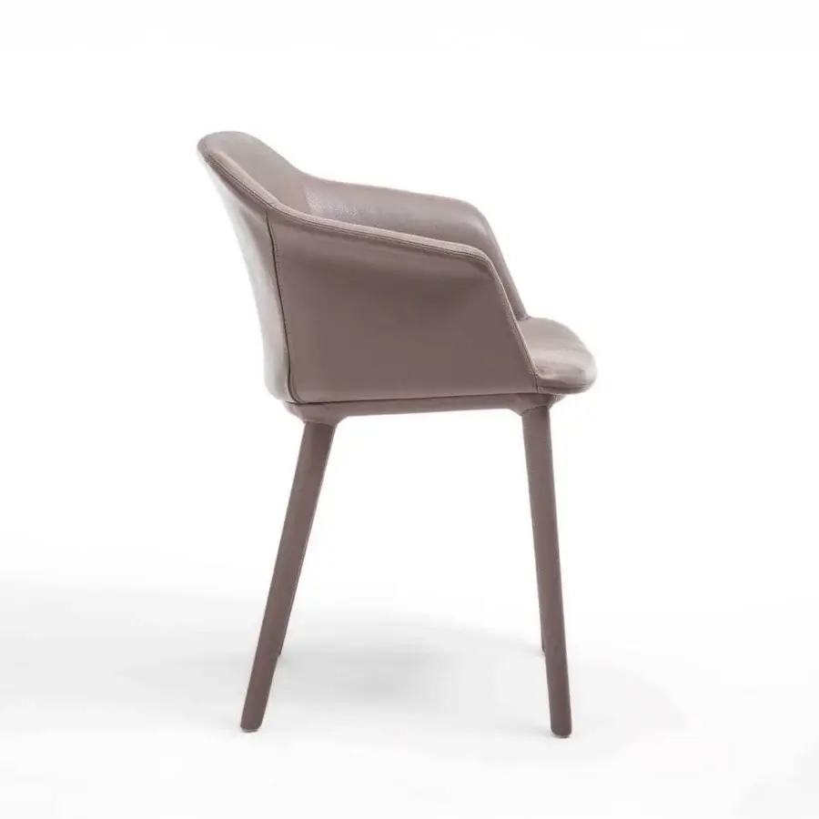 Elegant Enrico Pellizzoni Eva armchair with smooth leather upholstery and matte finish presents a taupe color and sculptural form