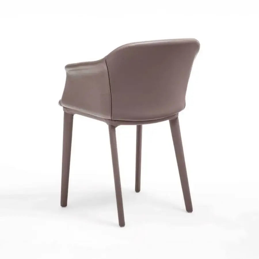 Superior Enrico Pellizzoni Eva armchair with smooth leather upholstery in a muted dusty rose tone and matte finish