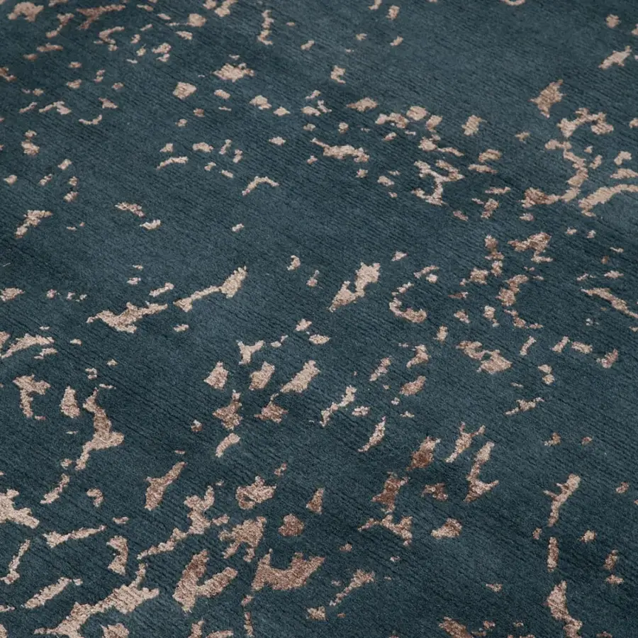 Lavish Amini Artemisia rug with organic pattern in deep teal accented with bronze, hand-knotted wool and viscose pile with carved finish