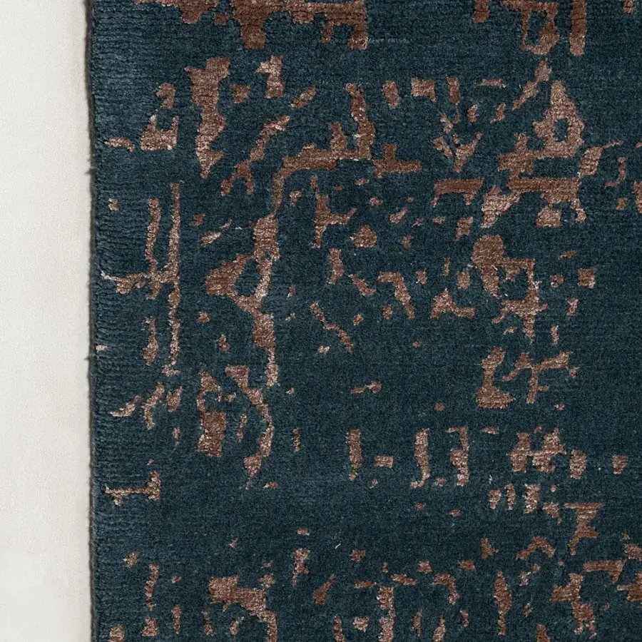 Exquisite Amini Artemisia rug with abstract pattern in deep teal and woven bronze tones, hand-knotted wool and viscose pile with carved finish