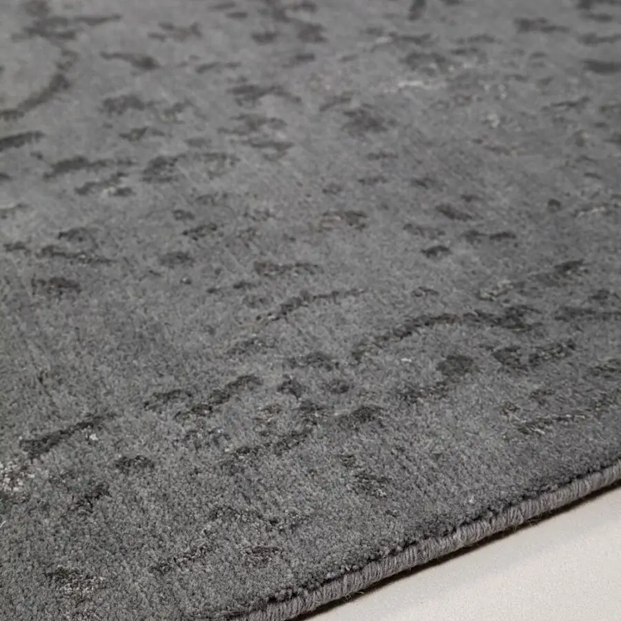 Distinguished Amini Artemisia rug hand-knotted in India with luxurious wool and viscose exhibiting a subtly distressed gray aesthetic with carved finish