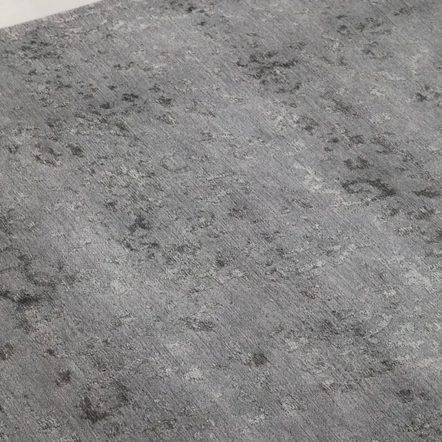 Exceptional Amini Artemisia rug hand-knotted in India with wool and viscose exhibiting a subtly distressed abstract pattern and refined texture