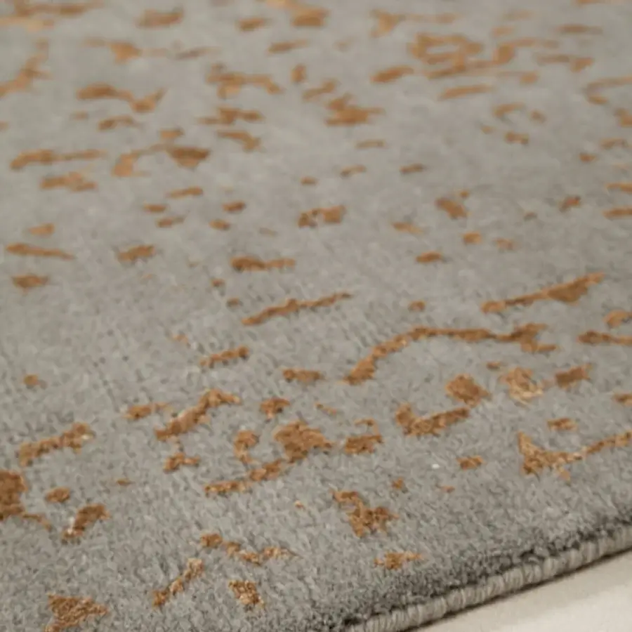 Distinguished Amini Artemisia rug hand-knotted in India with wool and viscose, showcasing a muted grey palette accented with golden-brown tones and a carved finish