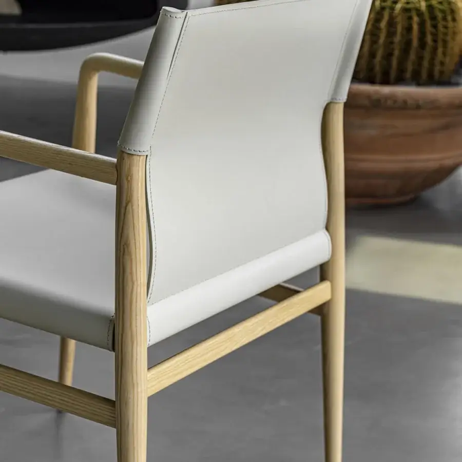 Elegant Enrico Pellizzoni Ledermann lounge chair crafted with cool gray leather and a light-toned hardwood frame