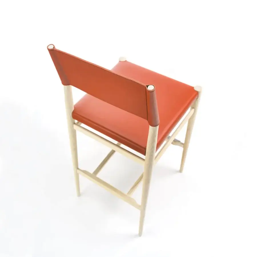 Exceptional Enrico Pellizzoni Ledermann counter stool crafted with reddish-orange leather and a sleek wooden structure