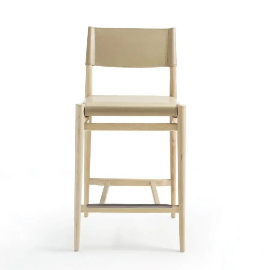 Meticulous Enrico Pellizzoni Ledermann counter stool built with natural wood and muted beige leather upholstery with a black base