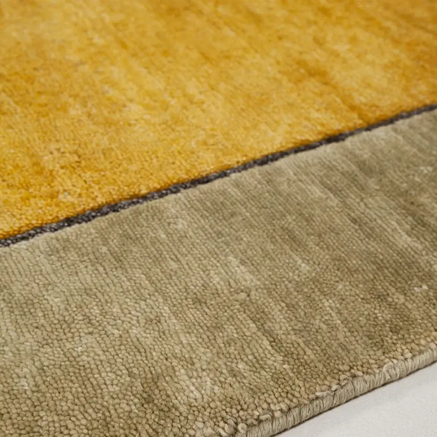 Distinguished Amini Ritagli rug with color block design in saffron lime and vintage platinum, hand-knotted with bamboo silk and carved texture