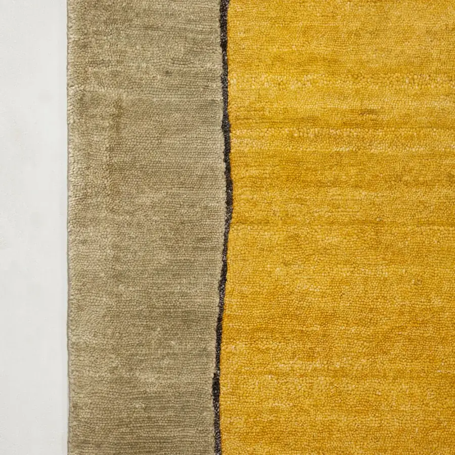 Distinguished Amini Ritagli bamboo silk rug with a color block aesthetic in grayish-green and golden-yellow, hand-washed and carved