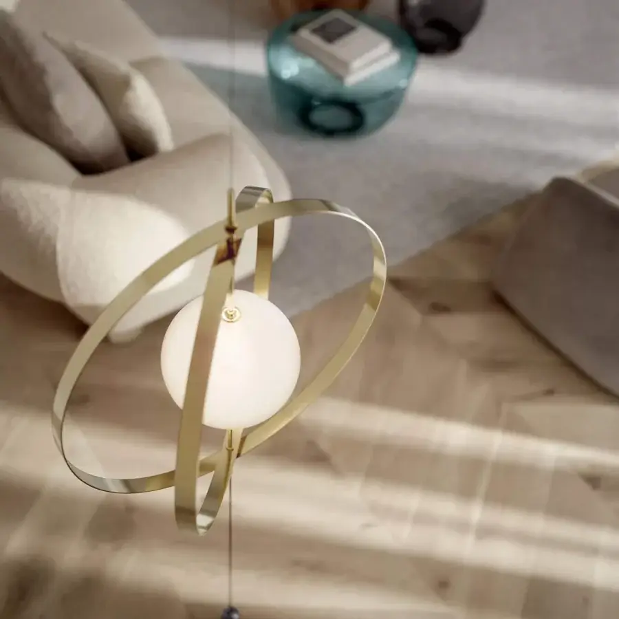 Exclusive Bontempi Papillon ceiling to floor lamp with concentric rotating rings and warm gold satin metal finish