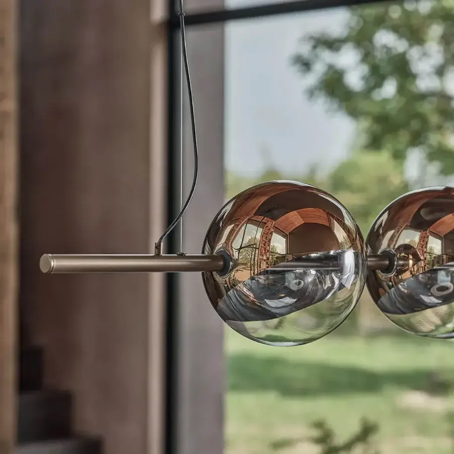 Superior Bontempi Sferatus suspension lamp with amber-tinted borosilicate glass spheres and warm bronze metal finish