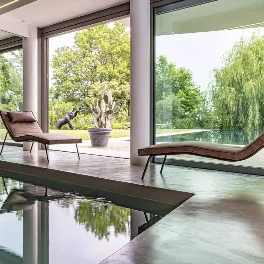 Superior Enrico Pellizzoni Daybed Chaise Lounge with curved silhouette and expertly crafted leather upholstery in a satin muted brown finish