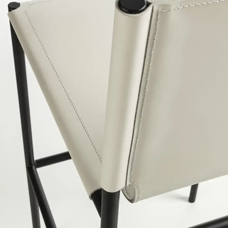 Distinguished Enrico Pellizzoni Elena stool crafted with off-white leather and a sleek black metal frame in matte finish