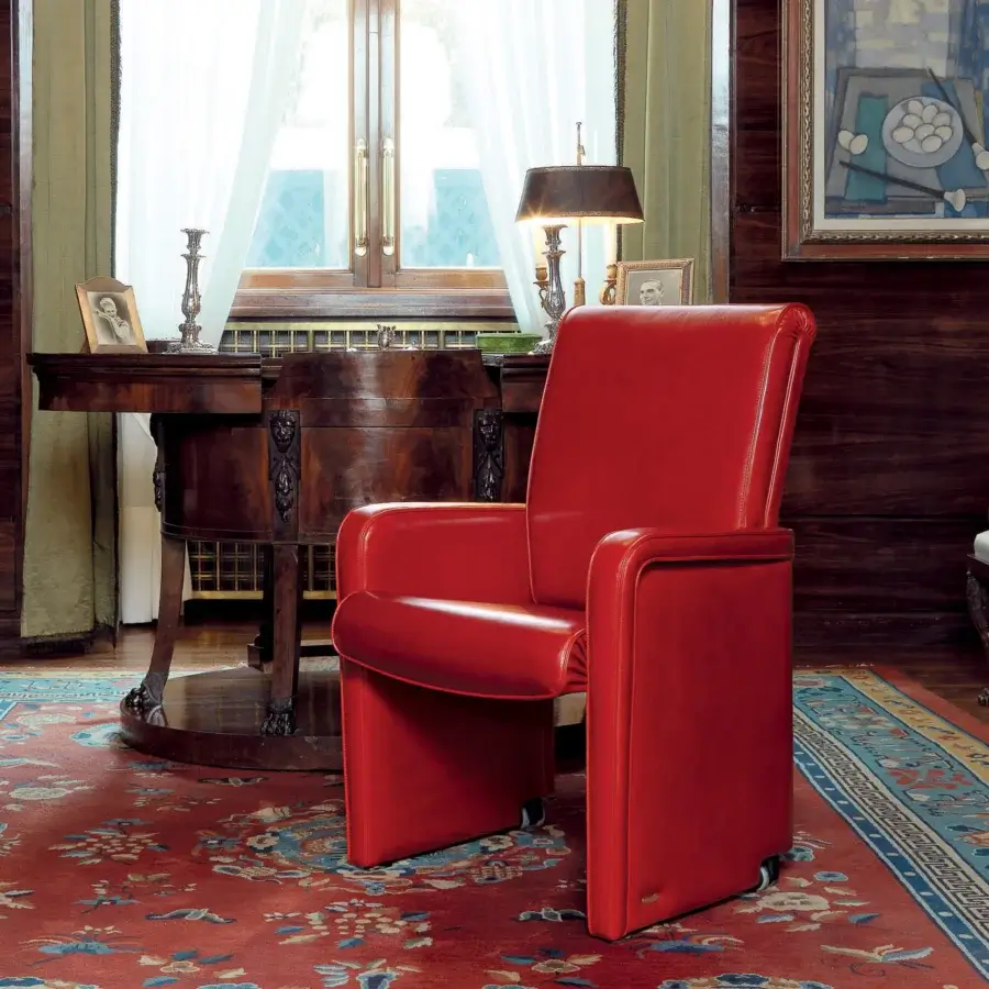Superior Mascheroni Ypsilon V armchair upholstered in vibrant red natural ox leather with a glossy finish
