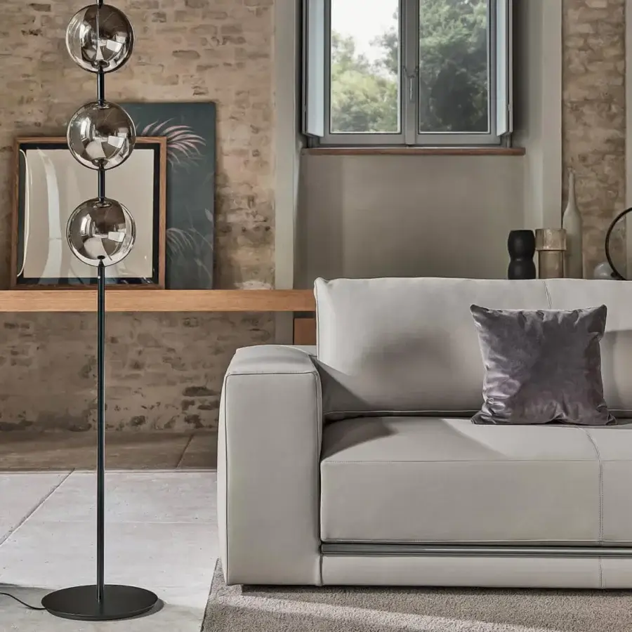 Elegant Bontempi Sferatus floor lamp with aligned translucent borosilicate glass spheres and matte black metal finish