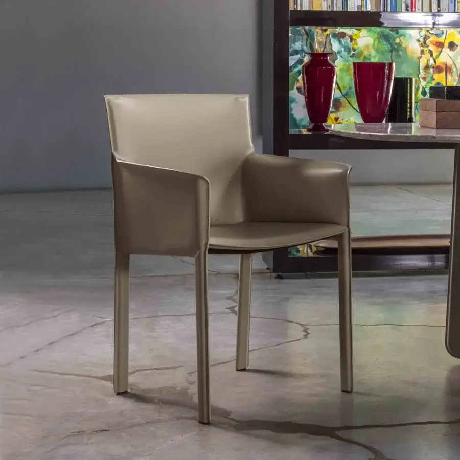 Exceptional Enrico Pellizzoni Pasqualina armchair with smooth leather upholstery and visible stitching in a muted gray tone