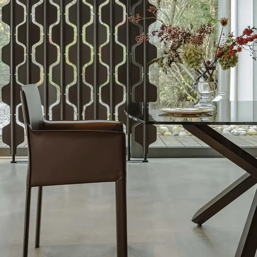 Superior Enrico Pellizzoni Pasqualina armchair with dark brown leather and satin finish showcasing skilled visible stitching
