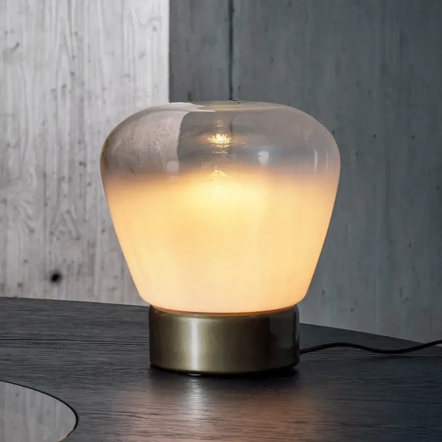 Distinguished Bontempi Stone table lamp with beautifully blown white glass shade and sleek matte brass-colored metal base