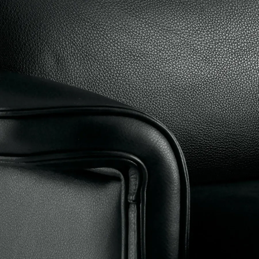 Refined Mascheroni Ypsilon office armchair upholstered in smooth matte leatherette with a rotating five-star base and integrated side compartment