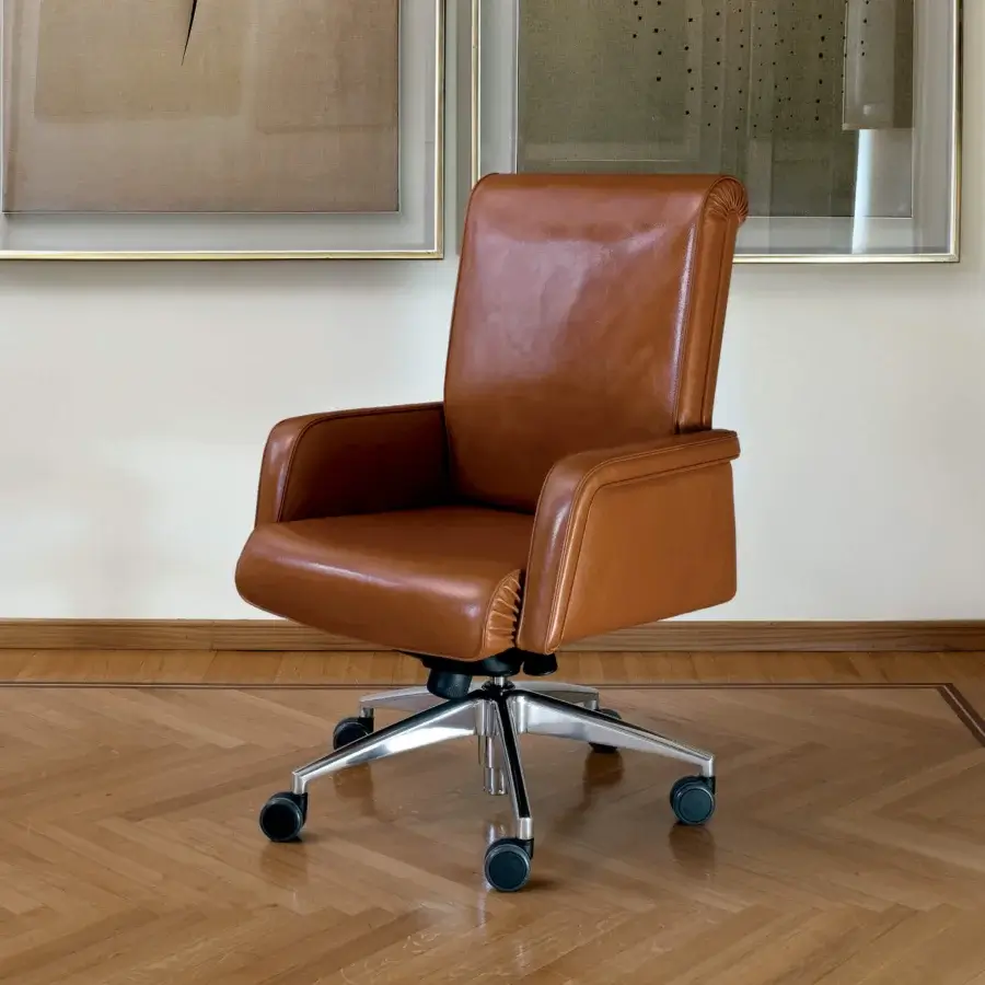 Exclusive Mascheroni Ypsilon office armchair upholstered in textured brown leather with satin metal rotating base