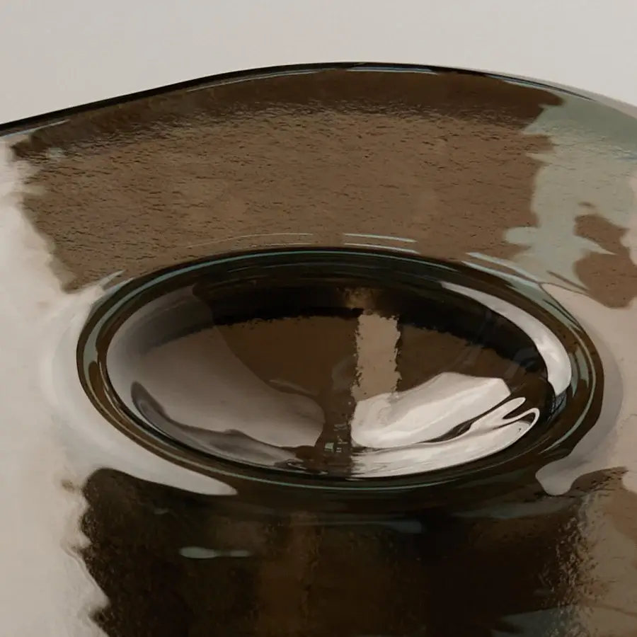 Superior Driade Coupelle coffee table with a glossy, fluid organic shape and deep brown hue crafted from advanced thermoforming
