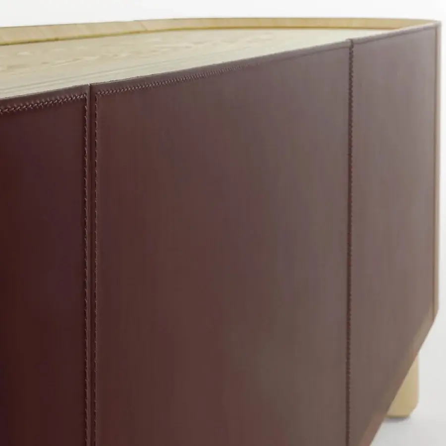 Distinguished Enrico Pellizzoni Isabel sideboard built with Canaletto walnut and sumptuous burgundy leather, showcasing meticulous stitched detail