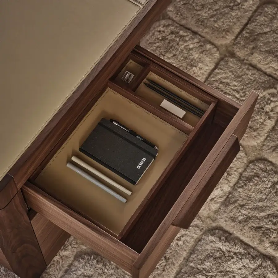 Superior Porada Agea desk built with solid canaletta walnut in a satin finish and Cuoietto saddle leather top