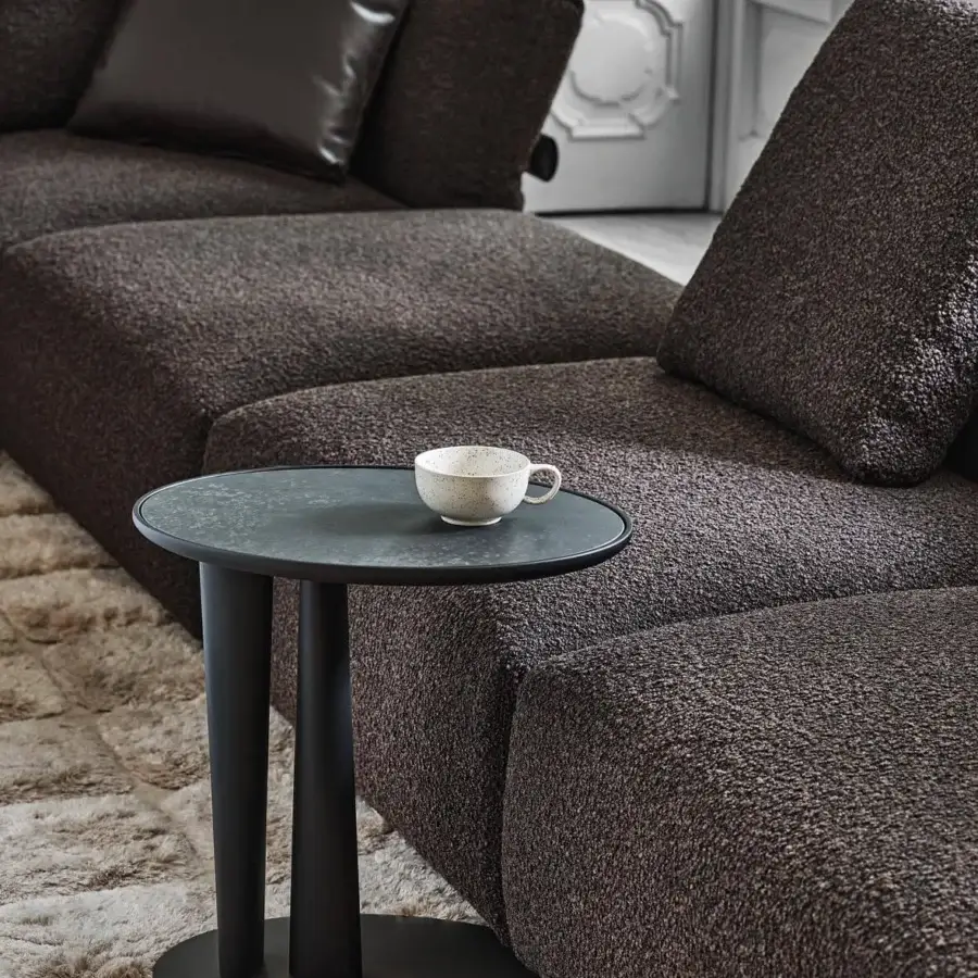 Elegant Porada Côté side table with charcoal wooden top and chevron inlay in matte finish