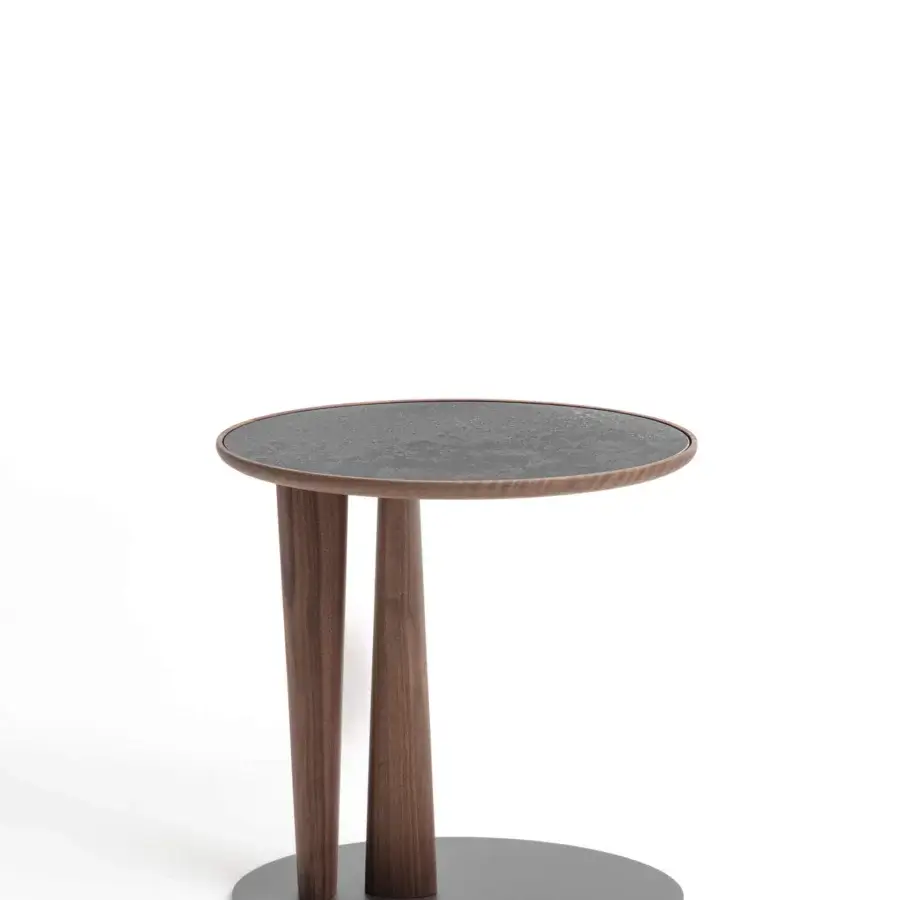 Exceptional Porada Côté side table with dark chevron inlaid tabletop and smoothly finished medium-toned wooden legs with a dark gray base