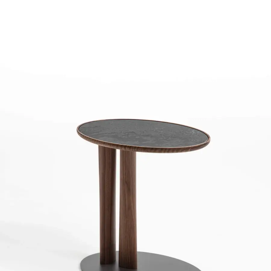 Exceptional Porada Côté side table with curved form, chevron wooden top and refined metal base with smooth finish