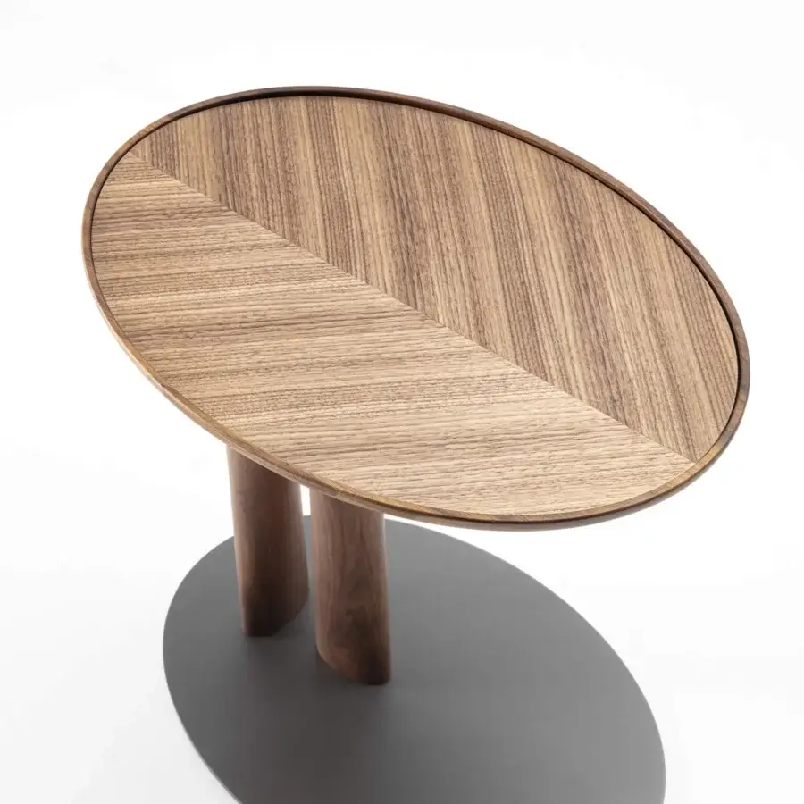 Distinguished Porada Côté side table with chevron wooden top and dark gray base crafted with cylindrical legs and satin finish