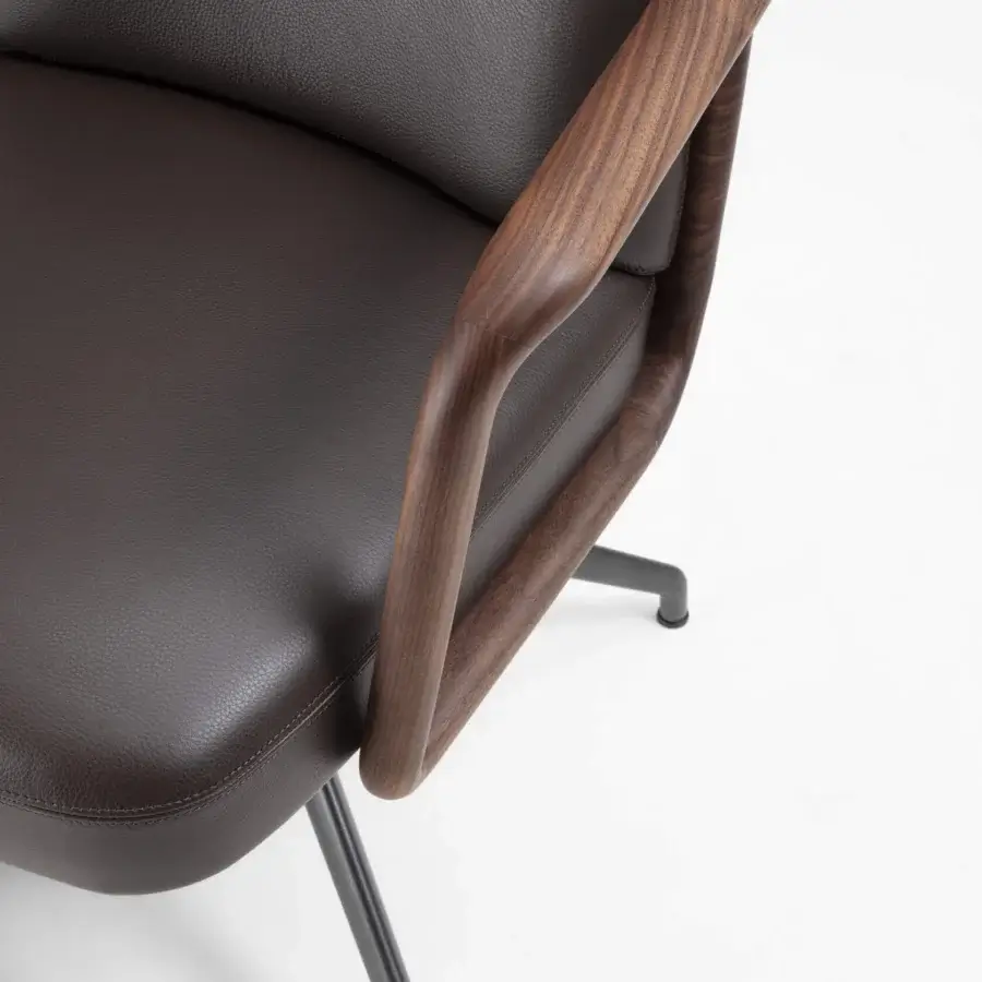 Superior Porada Cuna swivel chair with sculpted Canaletta walnut armrests and dark brown upholstered cushion in satin finish