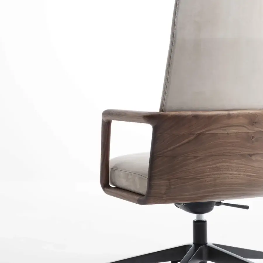 Elegant Porada Cuna swivel chair with sculpted Canaletta walnut frame and neutral gray textile upholstery with satin finish