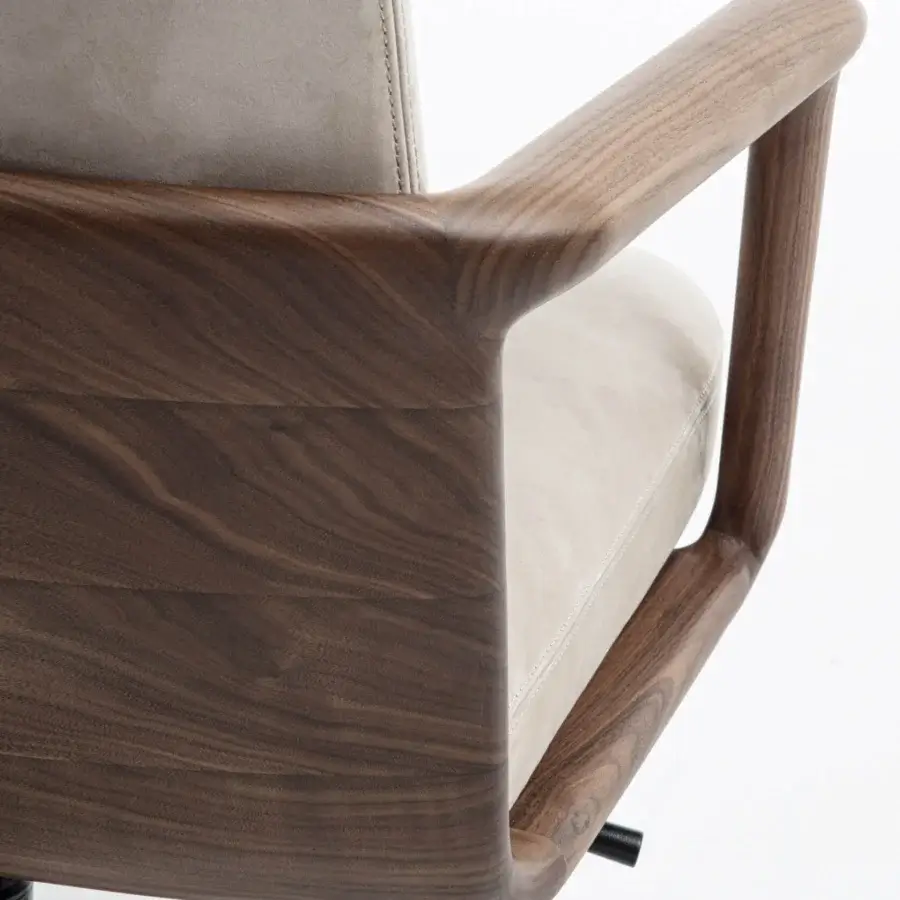 Elegant Porada Cuna swivel chair in beige upholstery with sculpted solid Canaletta walnut and satin finish